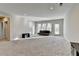 Bright, open basement featuring neutral walls and carpeting at 5732 Cypress Bluff Ln, Hoschton, GA 30548