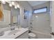 Clean bathroom with a bathtub and window at 5732 Cypress Bluff Ln, Hoschton, GA 30548