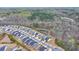 Aerial view of a residential community with lush greenery at 5732 Cypress Bluff Ln, Hoschton, GA 30548