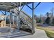 Backyard stairs leading to a patio and grassy area at 5732 Cypress Bluff Ln, Hoschton, GA 30548