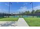 Well-lit pickleball courts with ample green space at 5732 Cypress Bluff Ln, Hoschton, GA 30548