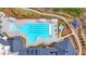 Aerial view of community pool with lap lanes and a spa at 5732 Cypress Bluff Ln, Hoschton, GA 30548