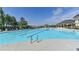 Community lap pool with expansive sundeck at 5732 Cypress Bluff Ln, Hoschton, GA 30548