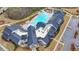 Community pool and clubhouse aerial view at 5732 Cypress Bluff Ln, Hoschton, GA 30548