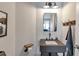 Simple bathroom with concrete sink and industrial style accents at 1316 Harris Way, Brookhaven, GA 30319