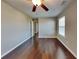 Bright bedroom with hardwood floors and ceiling fan at 2156 Villa Spring Ct, Dacula, GA 30019