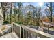 Deck overlooking wooded backyard with privacy at 996 Marietta Rd, Canton, GA 30114