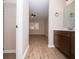 Modern bathroom with dark wood vanity and a shower/tub combo at 1184 Red Oak Cv, Tucker, GA 30084