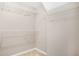 Large walk-in closet with wire shelving for ample storage at 516 Towler Shoals Vw, Loganville, GA 30052