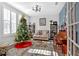 Living room with Christmas tree, piano, and comfy seating at 12 Ridgeline Nw Way, Cartersville, GA 30121