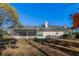 House exterior view with screened porch and grassy backyard at 1987 Ridge Water Ln, Lawrenceville, GA 30045