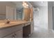 Primary bathroom with double vanity and marble floor at 1987 Ridge Water Ln, Lawrenceville, GA 30045