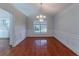 Formal dining room with hardwood floors and chandelier at 1987 Ridge Water Ln, Lawrenceville, GA 30045