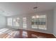 Dining area with hardwood floors and backyard access at 1987 Ridge Water Ln, Lawrenceville, GA 30045