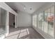 Sunroom with multiple windows and carpeted floor at 1987 Ridge Water Ln, Lawrenceville, GA 30045