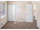 Well-lit bedroom with carpet and ample closet space at 763 Tara Se Cir, Atlanta, GA 30354