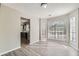 Dining area with hardwood floors and bay window, kitchen access at 1954 Big Branch Ct, Lithonia, GA 30058