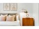 Close-up of bedroom with pillows and mid-century modern nightstand at 130 Arizona Ne Ave # 104, Atlanta, GA 30307