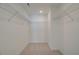 Large walk-in closet with wire shelving at 693 Sunstone Ln, Lawrenceville, GA 30043