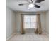 Bright bedroom with large window, ceiling fan, and neutral decor at 936 Turner Se Dr, Smyrna, GA 30080