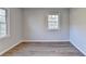 Bright bedroom with wood-look floors and neutral walls at 190 Stroud Se Dr, Mableton, GA 30126