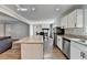 Modern kitchen with white cabinets and granite countertops at 190 Stroud Se Dr, Mableton, GA 30126