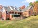 Ranch style brick home with landscaping and large yard at 775 N Ola N Rd, Mcdonough, GA 30252