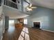 Open living room with high ceilings and fireplace at 705 Jay St, Canton, GA 30115