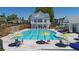 Resort-style swimming pool with lounge chairs and umbrellas at 4004 Moody Ln, Woodstock, GA 30188