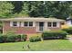 Brick ranch house with well-maintained landscaping at 3436 Adkins Rd, Atlanta, GA 30331