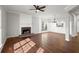 Open living and dining area with hardwood floors and fireplace at 4618 Liberty Square Dr, Acworth, GA 30101