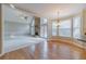 Bright breakfast area with hardwood floors and view of Gathering room at 2590 Hidden Wood Ln, Lawrenceville, GA 30043