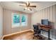 Bright bedroom featuring hardwood floors and a workspace at 1374 Margarette Dr, Decatur, GA 30035