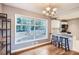 Dining area with hardwood floors and large windows at 1374 Margarette Dr, Decatur, GA 30035