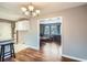 Bright dining area with hardwood floors and view to living room at 1374 Margarette Dr, Decatur, GA 30035