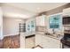 Modern kitchen with stainless steel appliances and granite countertops at 1374 Margarette Dr, Decatur, GA 30035