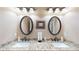 Elegant bathroom with and sinks and granite countertops at 4079 Bullock Bridge Rd, Loganville, GA 30052