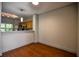 Bright dining room with hardwood floors and kitchen views at 3064 Lauren Parc Rd, Decatur, GA 30032