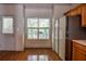 Kitchen with wood floors and a view to backyard at 3064 Lauren Parc Rd, Decatur, GA 30032