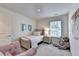 Cozy bedroom with a twin-size bed, a large teddy bear, and a window with blinds at 2484 Honey Way, Conyers, GA 30013