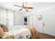 Well-lit bedroom with a double bed and built-in wardrobe at 2829 Ashwood Pl, Decatur, GA 30030