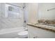 Clean bathroom with granite countertop and tiled shower at 4404 Mercer Rd, Decatur, GA 30035