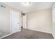 Spacious bedroom featuring carpet and ample closet space at 4404 Mercer Rd, Decatur, GA 30035
