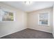 Bright bedroom with neutral walls and carpet at 4404 Mercer Rd, Decatur, GA 30035