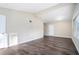 Bright living room with vinyl flooring and neutral walls at 4404 Mercer Rd, Decatur, GA 30035