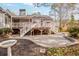 Large patio with stamped concrete and landscaping at 6187 Brookside Ln, Acworth, GA 30102