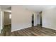 Open living space with wood-look floors at 8775 Lee Rd, Lithia Springs, GA 30122