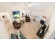 Open living room with a fireplace and comfortable seating at 2741 Sedgeview Ne Ln, Buford, GA 30519