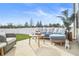 Cozy patio furniture on a concrete patio at 1049 Bodega Loop, Locust Grove, GA 30248