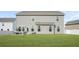 Large backyard with grassy lawn at 1049 Bodega Loop, Locust Grove, GA 30248